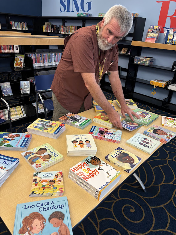 Organizing Ben Harman supporting the Reading Initiative, Walnut Park